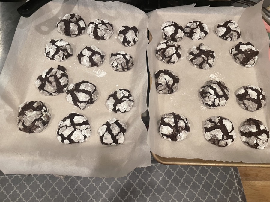 A batch of baked chocolate crinkle cookies for Cookie Club