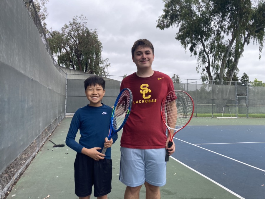 Chris coaching tennis through the Magical Bridge Foundation